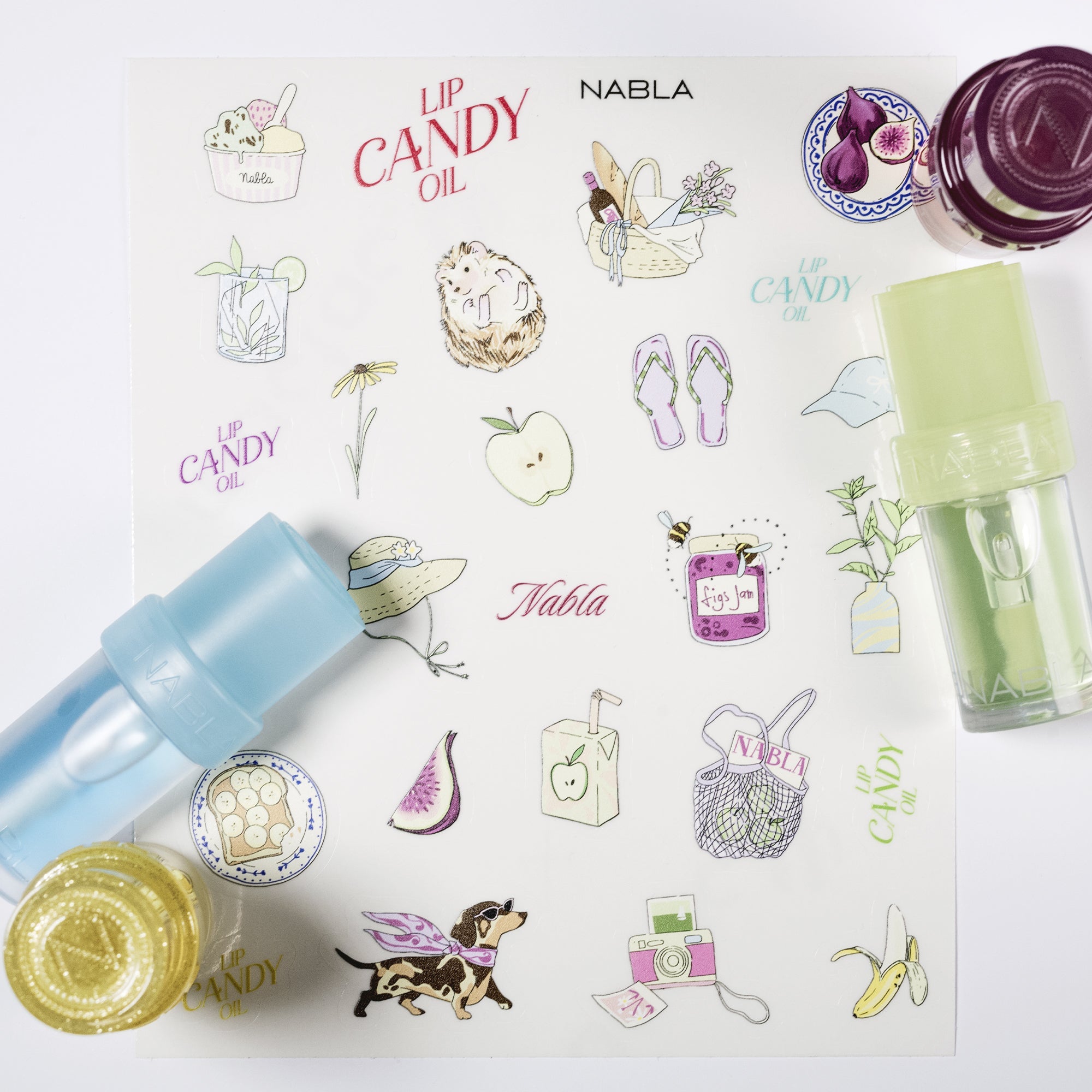 nabla-cosmetics-fruity-summer-lip-candy-oil-set-set-4-oli-labbra-sticker-e-chain image 3